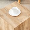 Elevate your living space with this square modern MDF coffee table that showcases smooth