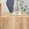 Elevate your living space with this square modern MDF coffee table that showcases smooth